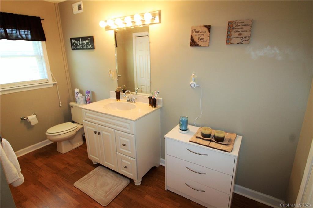 2333 Lawrence Road Clover, SC 29710 - Photo 22 of 35 a bathroom with a toilet sink and mirror