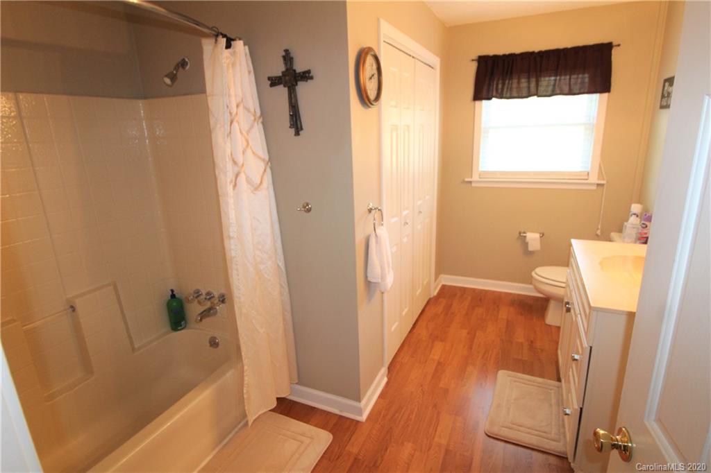 2333 Lawrence Road Clover, SC 29710 - Photo 23 of 35 a bathroom with a tub shower and a sink