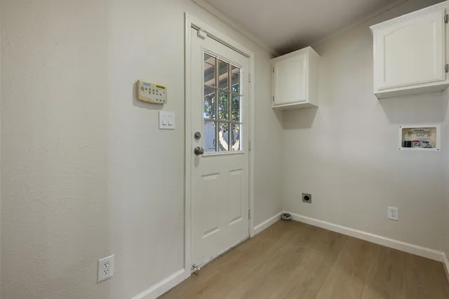 a bathroom with a toilet a sink and a shower