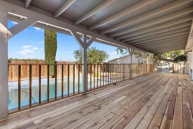 swimming pool with outdoor seating