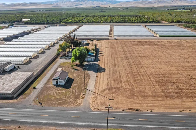 a view of a terrace with yard