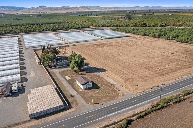 a view of a terrace with yard