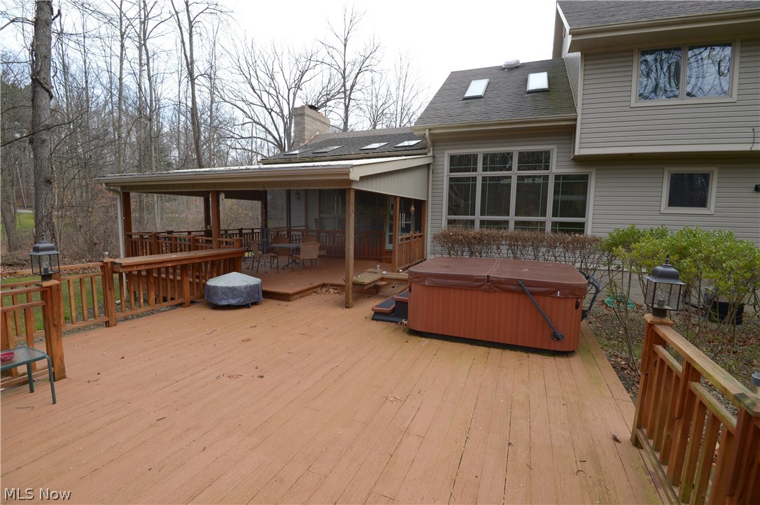 2749 Howland Wilson Road Northeast Warren, OH 44484 - Photo 3 of 25 huge deck with an uncovered portion, covered portion, & screened porch
