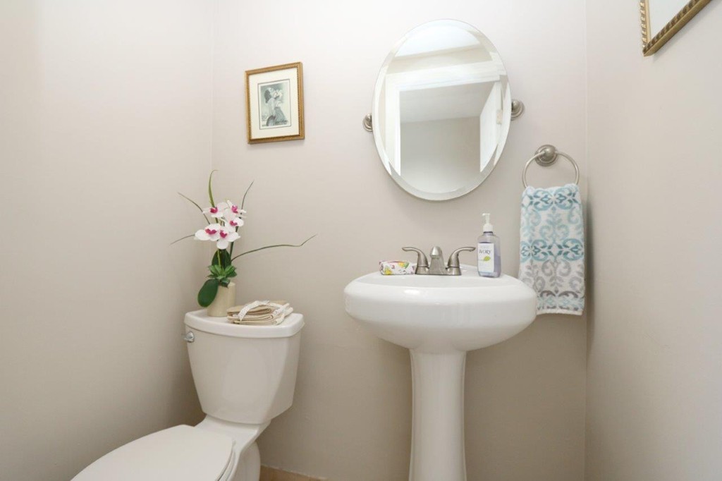 46-48 Raldne Road, Unit 48 Boston, MA 02136 - Photo 5 of 13 a bathroom with a toilet sink and mirror