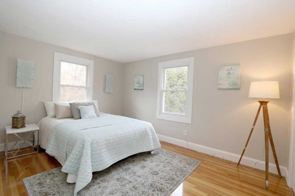 46-48 Raldne Road, Unit 48 Boston, MA 02136 - Photo 8 of 13 a bedroom with a bed and a window