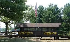 a view of a street with sitting area