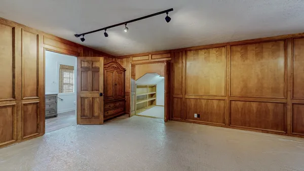 a view of a hallway with closet