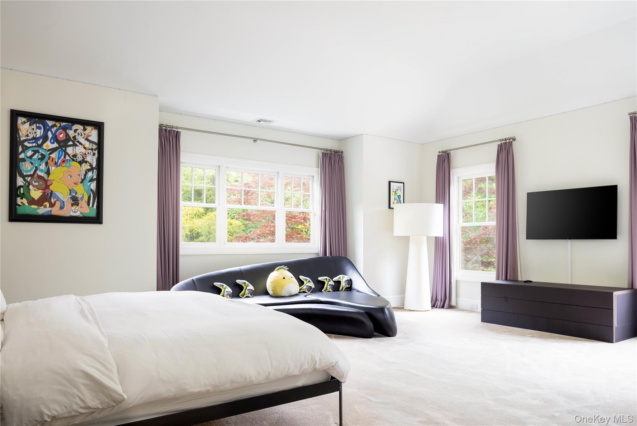 486 Middle Line Highway Bridgehampton, NY 11976 - Photo 17 of 25 a bedroom with a bed and a flat screen tv