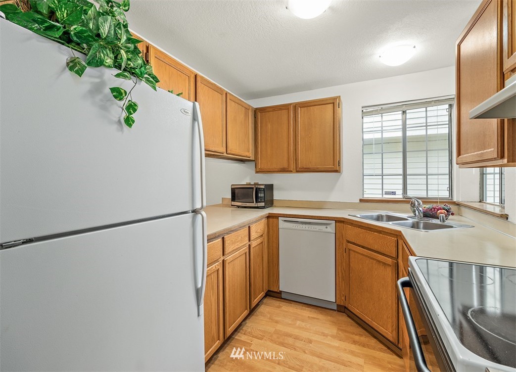 2122 186th Place Southeast Bothell, WA 98012 - Photo 17 of 25 a kitchen with appliances cabinets and a sink