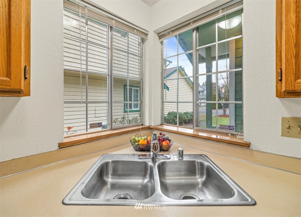 2122 186th Place Southeast Bothell, WA 98012 - Photo 19 of 25 a view of kitchen sink next to a window
