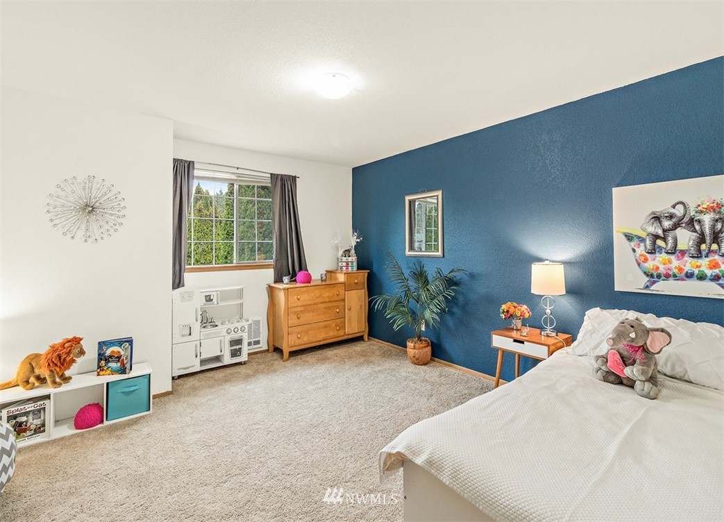2122 186th Place Southeast Bothell, WA 98012 - Photo 24 of 25 a bedroom with bed and window