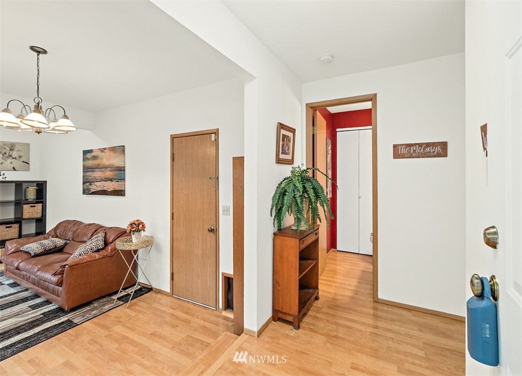 2122 186th Place Southeast Bothell, WA 98012 - Photo 4 of 25 a bedroom with furniture and a potted plant