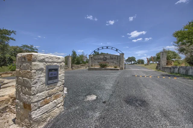 a view of a road with a building in the background