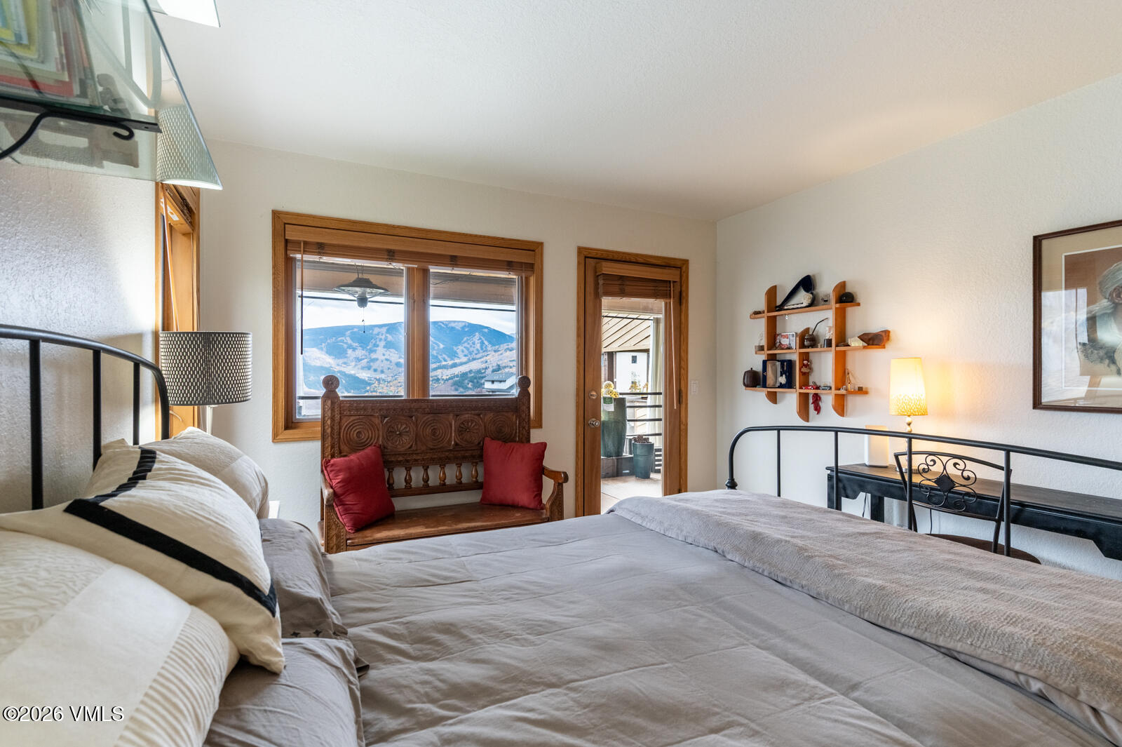 3016 Wildridge Road, Unit 6 Avon, CO 81620 - Photo 22 of 37 a bedroom with a bed and a window
