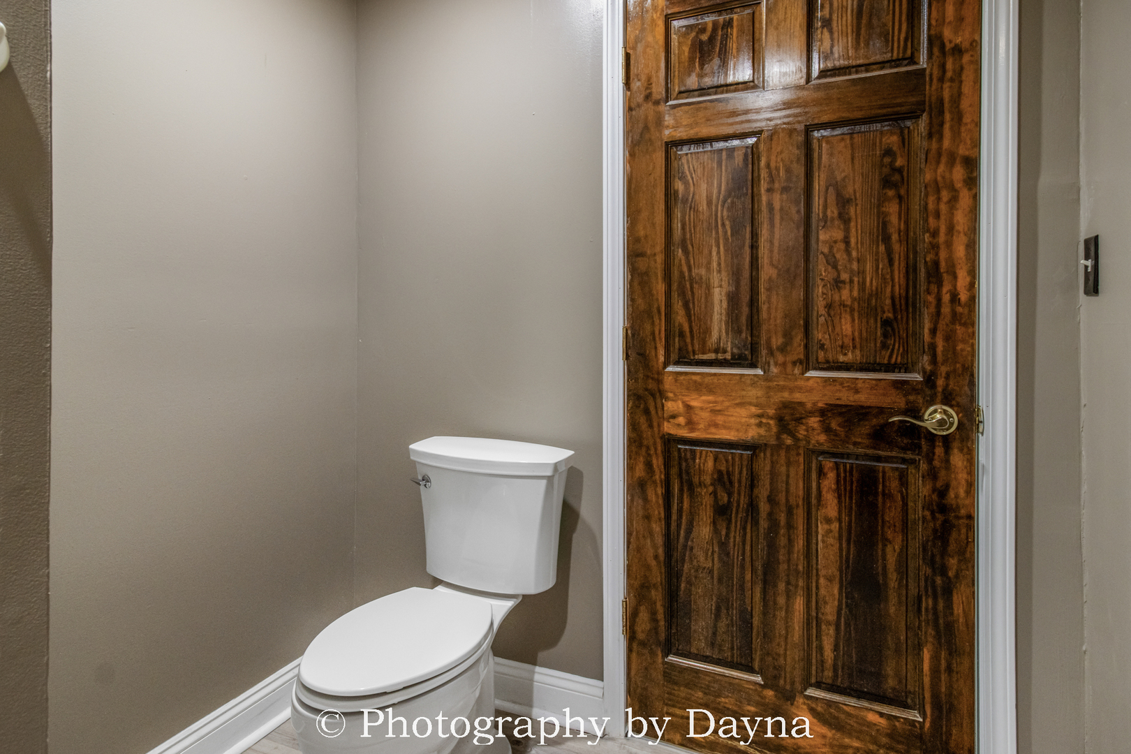 569 South Chestnut Street Chebanse, IL 60922 - Photo 7 of 22 a white toilet sitting next to a shower