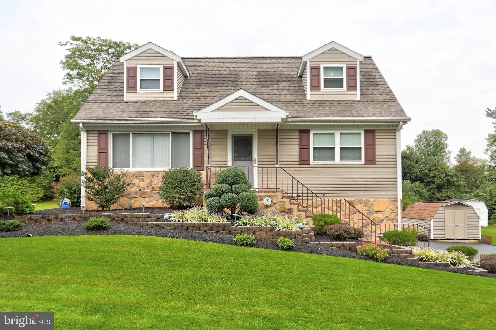 977 Hampden Road Elizabethtown, PA 17022 - Photo 1 of 25 a front view of a house with a yard