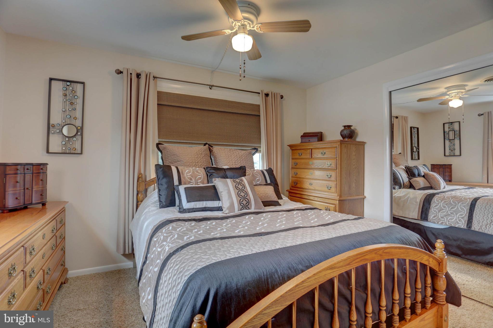 977 Hampden Road Elizabethtown, PA 17022 - Photo 11 of 25 a bedroom with furniture and a chandelier