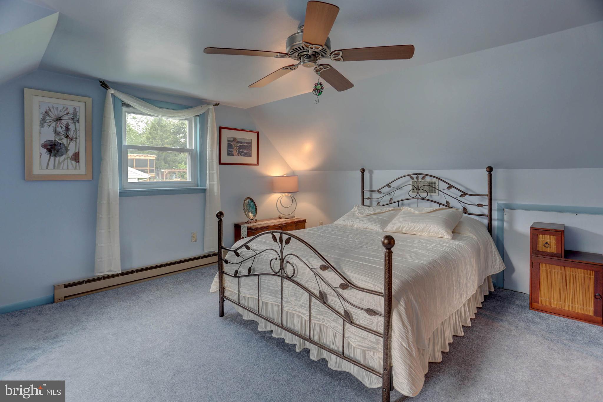 977 Hampden Road Elizabethtown, PA 17022 - Photo 14 of 25 a bedroom with a bed and a chandelier