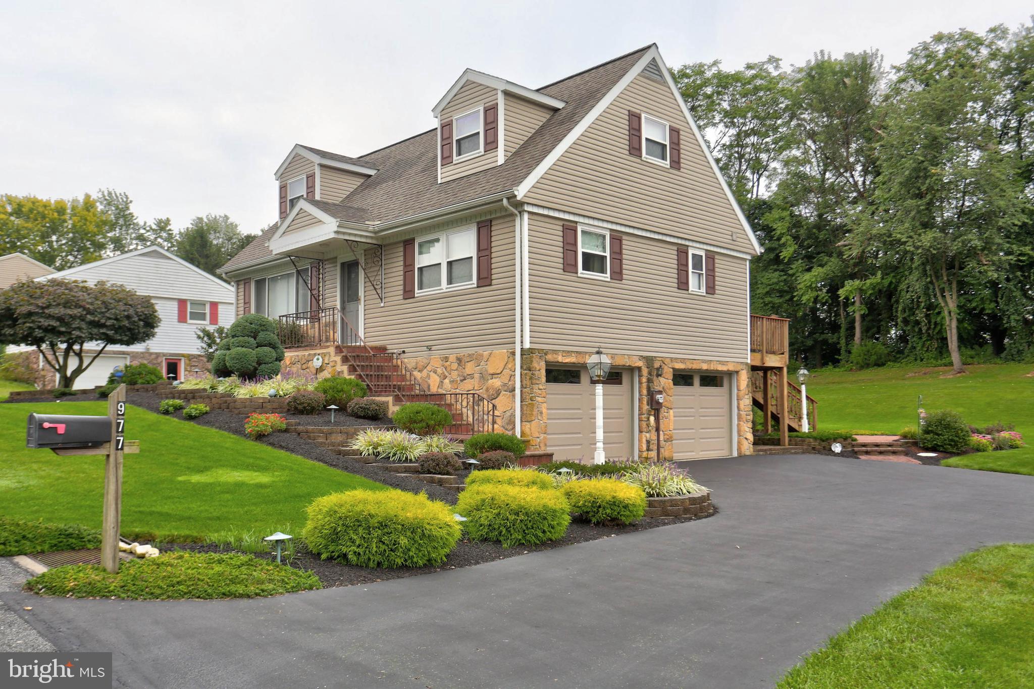 977 Hampden Road Elizabethtown, PA 17022 - Photo 3 of 25 a view of a house with a swimming pool and a yard