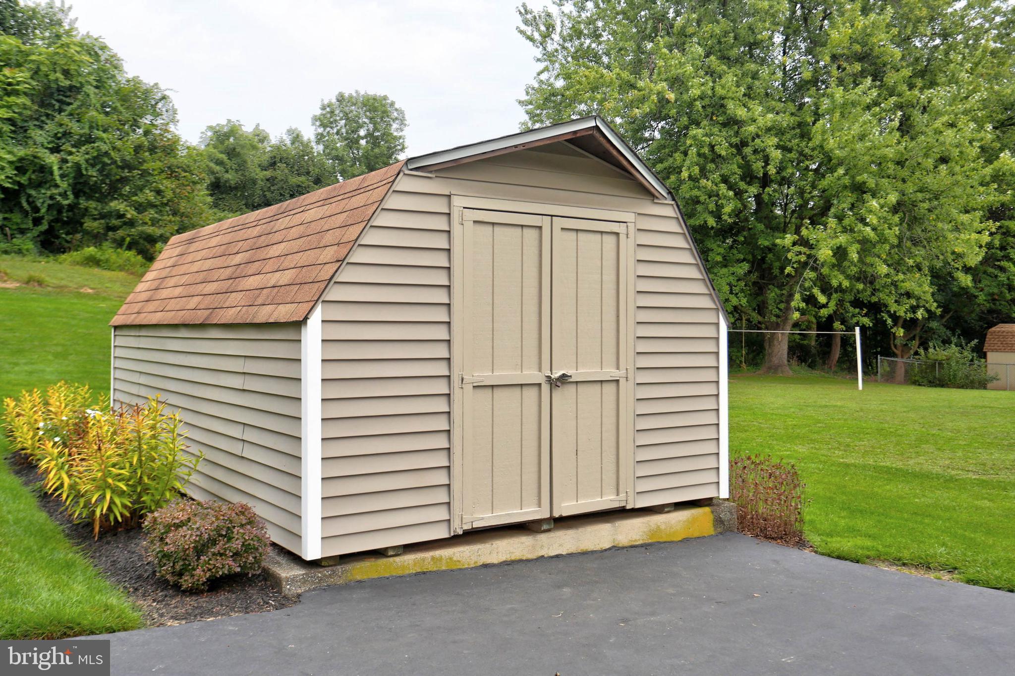 977 Hampden Road Elizabethtown, PA 17022 - Photo 22 of 25 a view of a small house with a yard