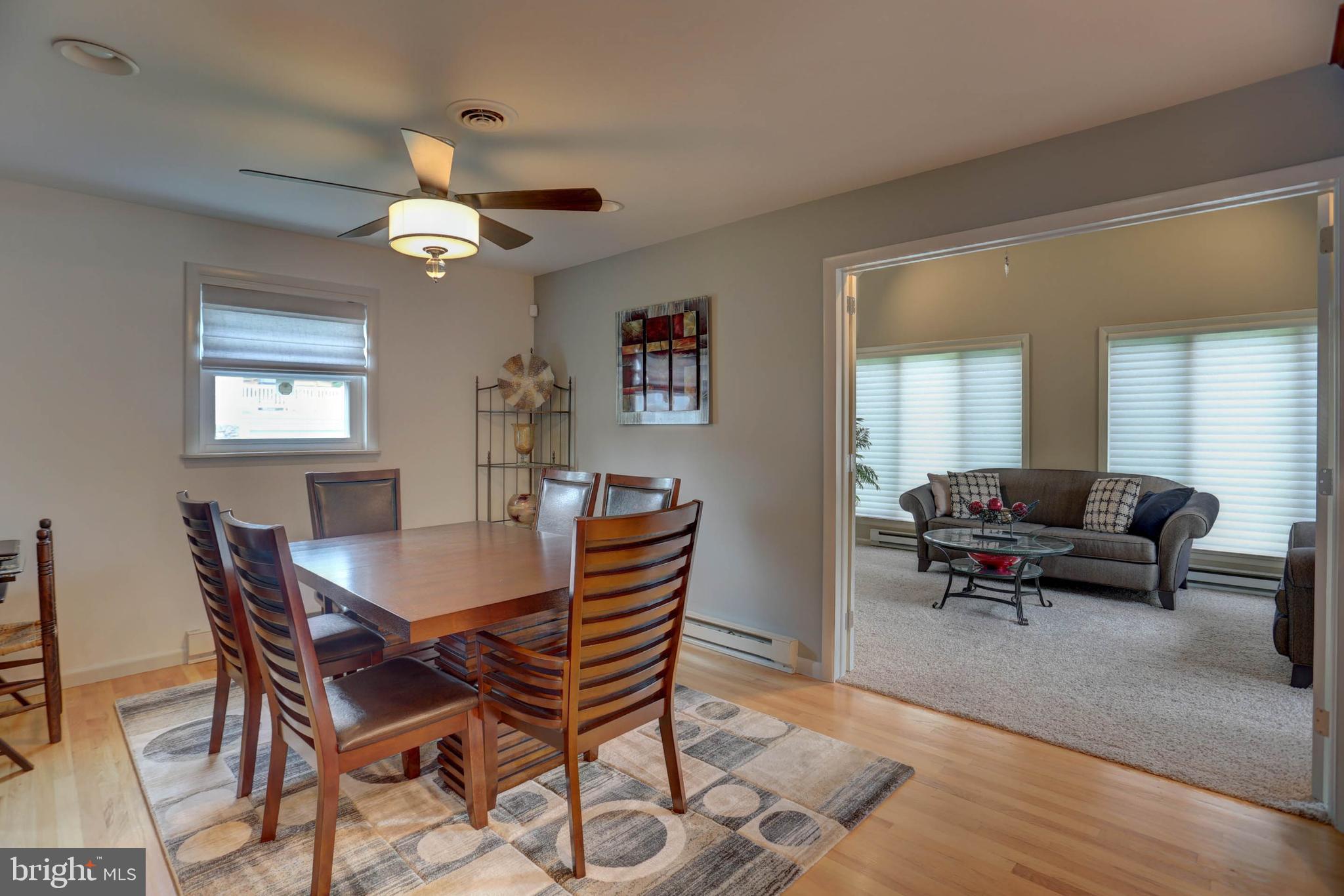 977 Hampden Road Elizabethtown, PA 17022 - Photo 6 of 25 a living room with furniture a window and a chandelier