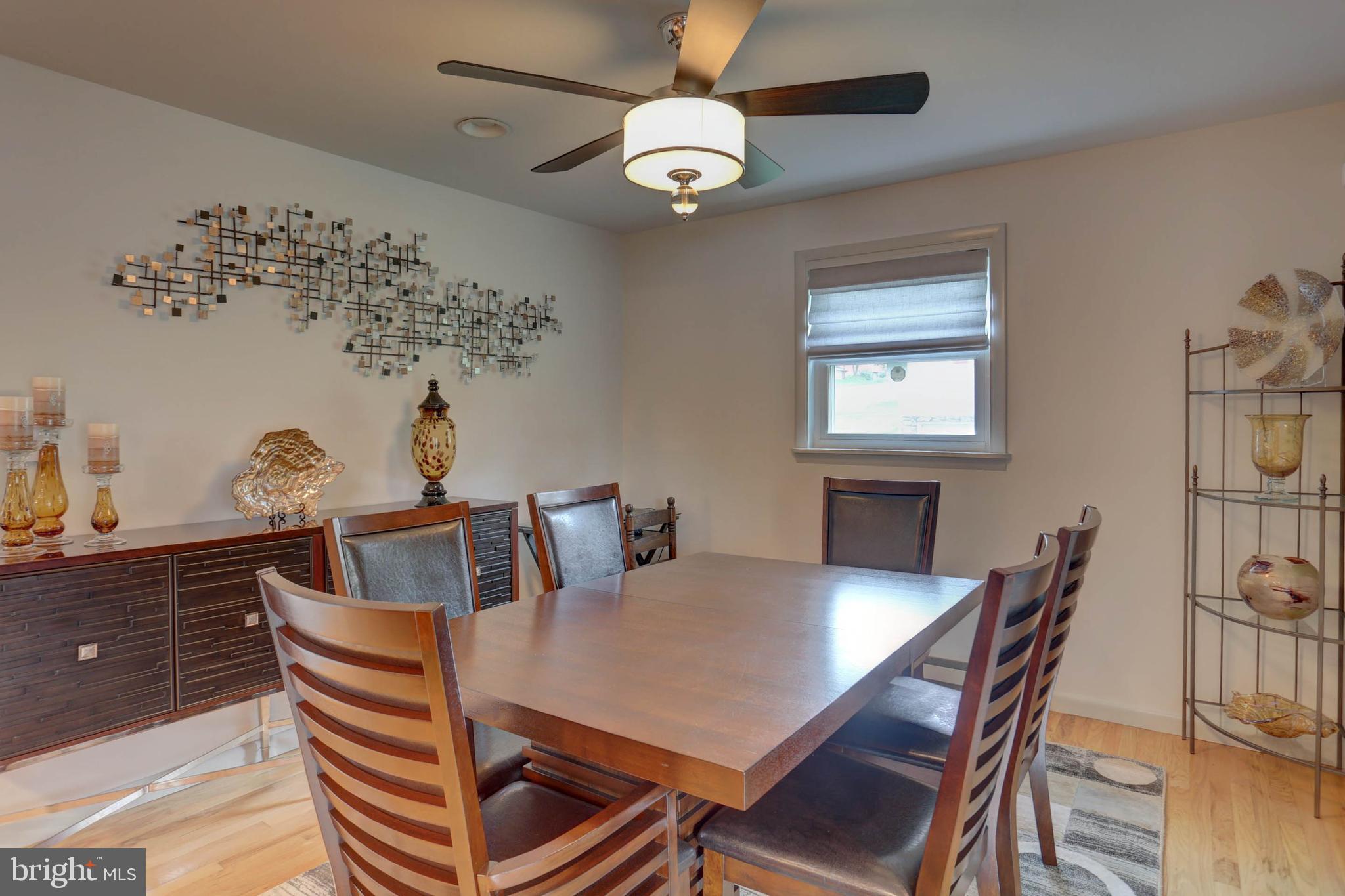 977 Hampden Road Elizabethtown, PA 17022 - Photo 7 of 25 a view of a dining room with furniture and chandelier