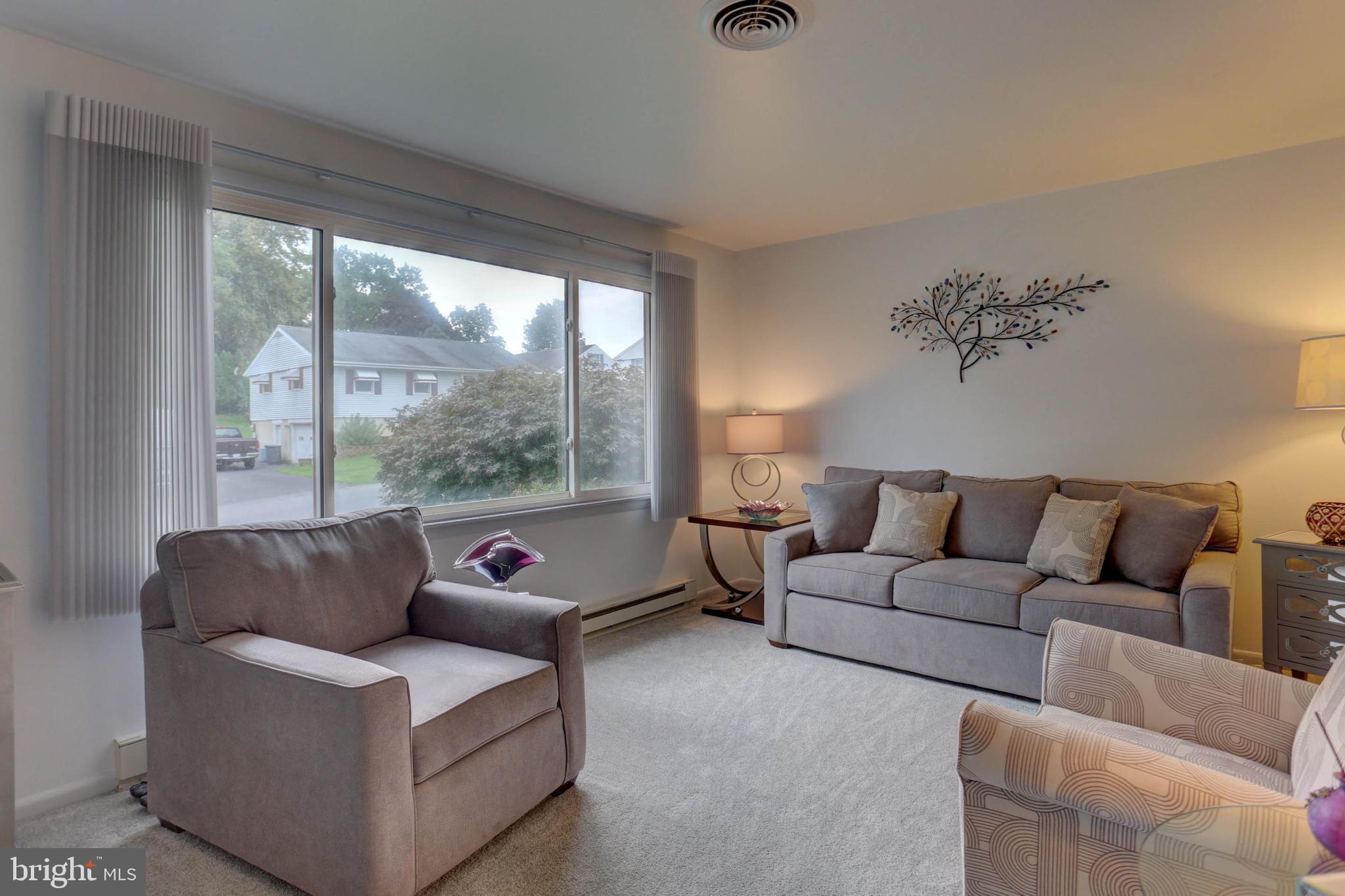 977 Hampden Road Elizabethtown, PA 17022 - Photo 9 of 25 a living room with furniture and a large window