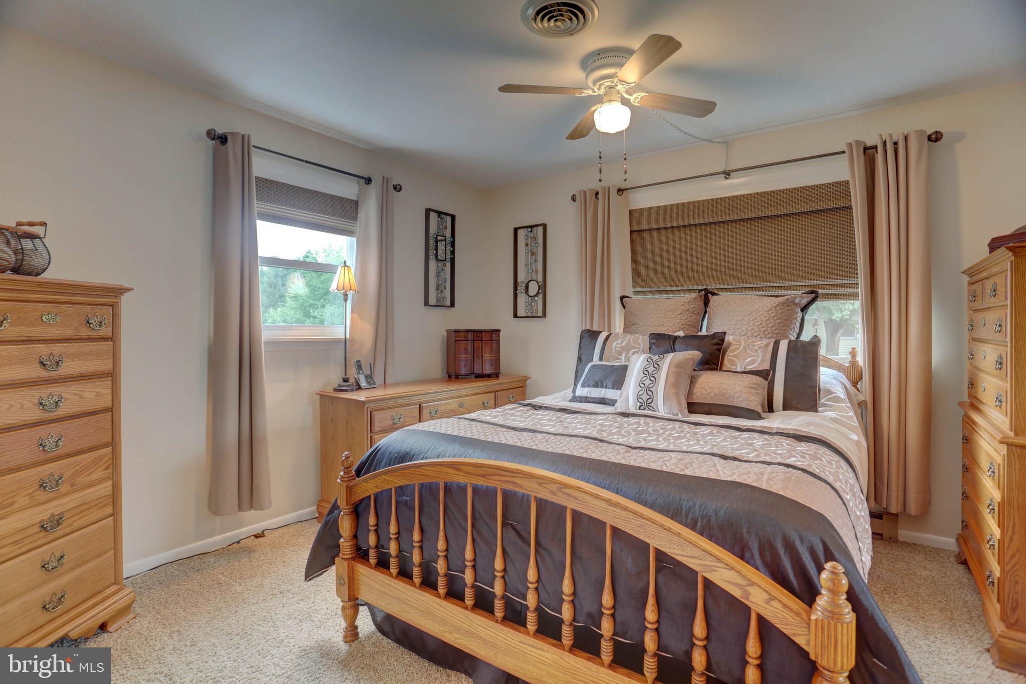 977 Hampden Road Elizabethtown, PA 17022 - Photo 10 of 25 a bedroom with a bed and a chandelier