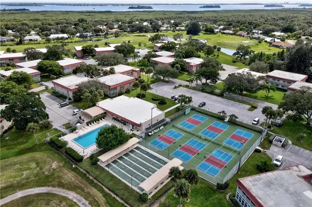 an aerial view of a city with lots of residential buildings