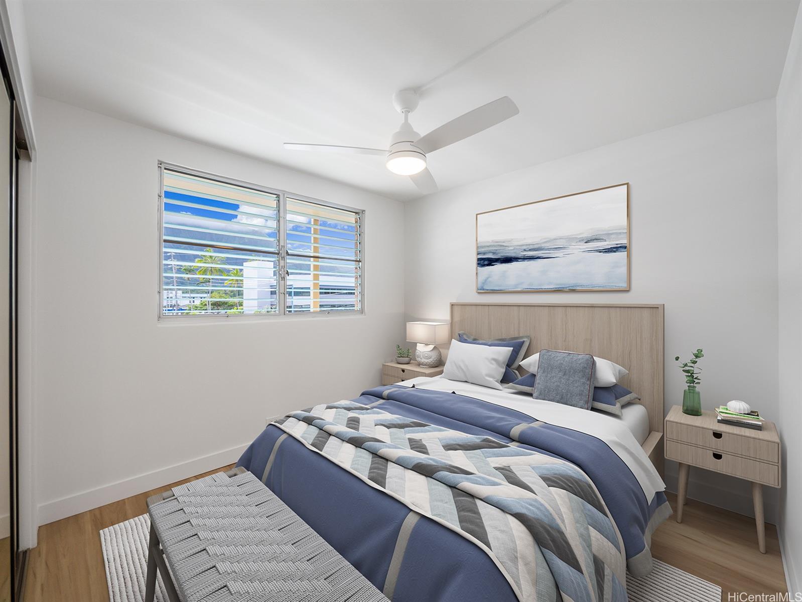 45-342 Lilipuna Road, Unit 204 Kaneohe, HI 96744 - Photo 3 of 25 a bedroom with a bed and a window