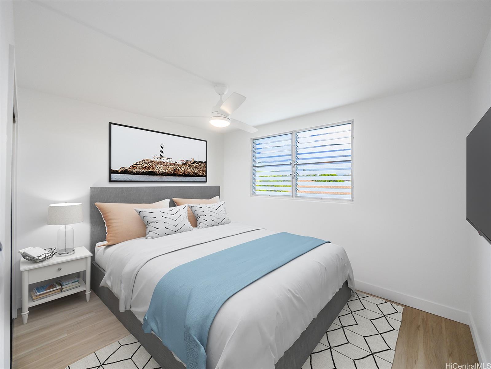 45-342 Lilipuna Road, Unit 204 Kaneohe, HI 96744 - Photo 4 of 25 a bedroom with a bed and a window