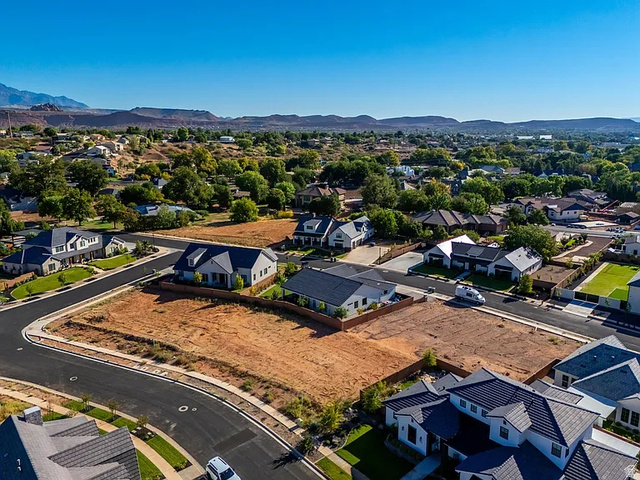 1240 North Gallen Road, Unit 12 Santa Clara, UT 84765 - Photo 10 of 19 Expansive undeveloped lots within a residential neighborhood featuring paved streets and surrounding homes