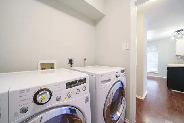 a utility room with dryer and washer