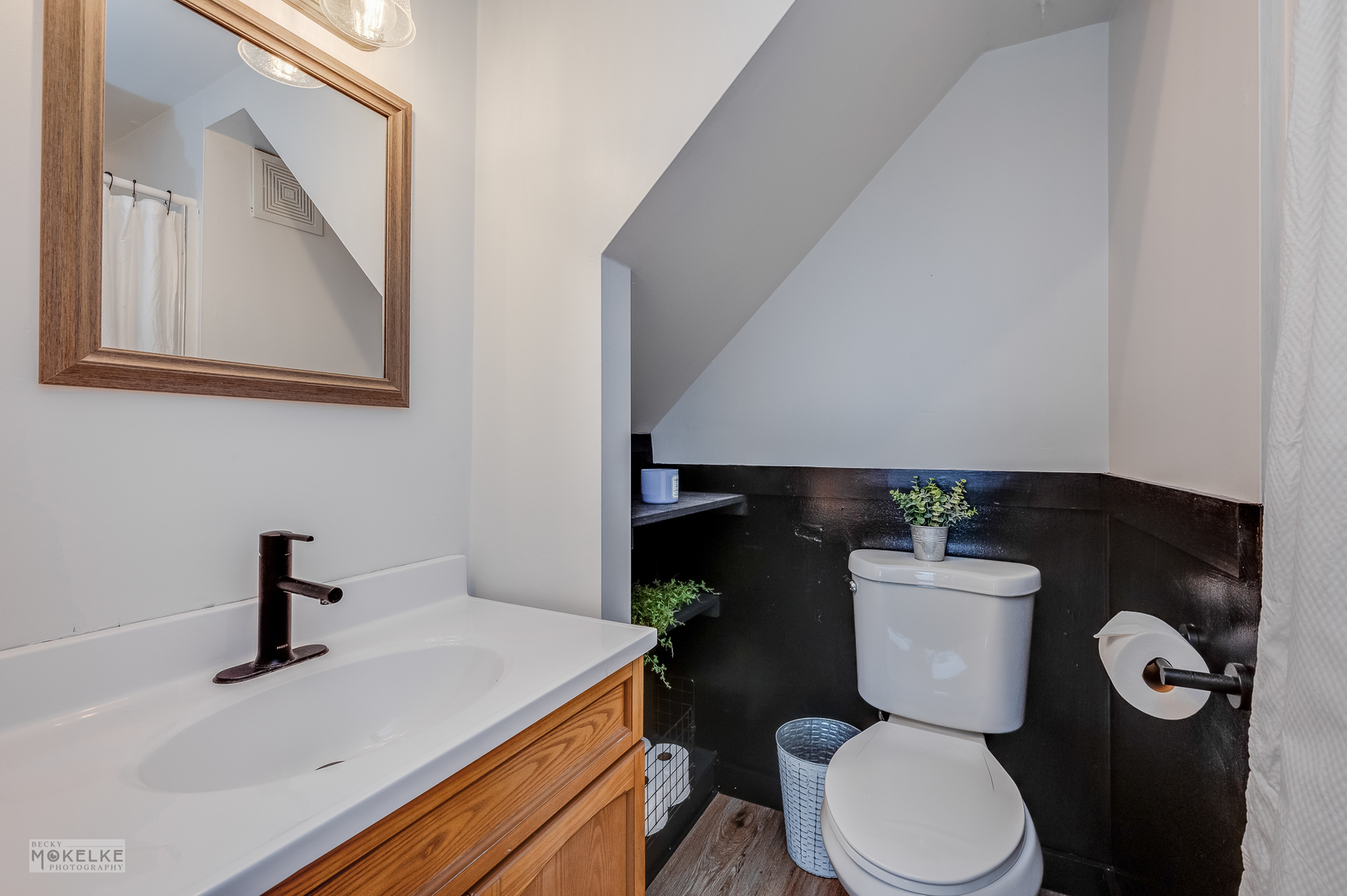 3494 Howlett Road Paw Paw, IL 61353 - Photo 16 of 47 a bathroom with a toilet a sink and mirror