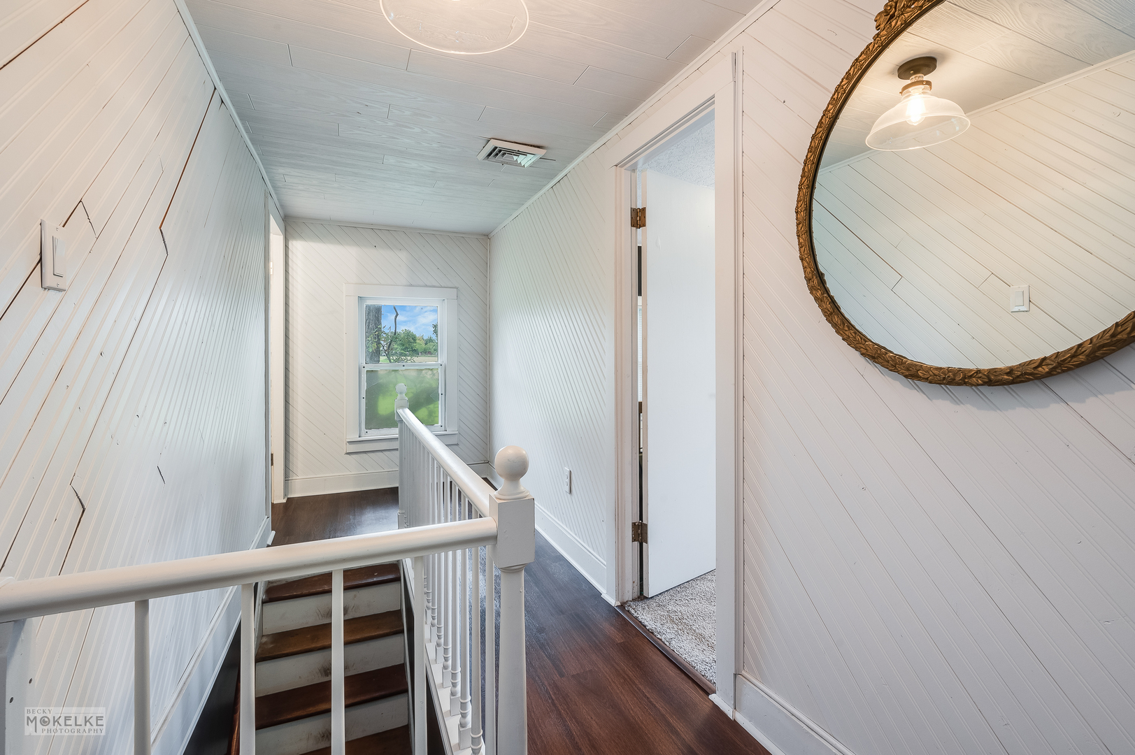 3494 Howlett Road Paw Paw, IL 61353 - Photo 24 of 47 a view of a hallway with wooden floor and entryway