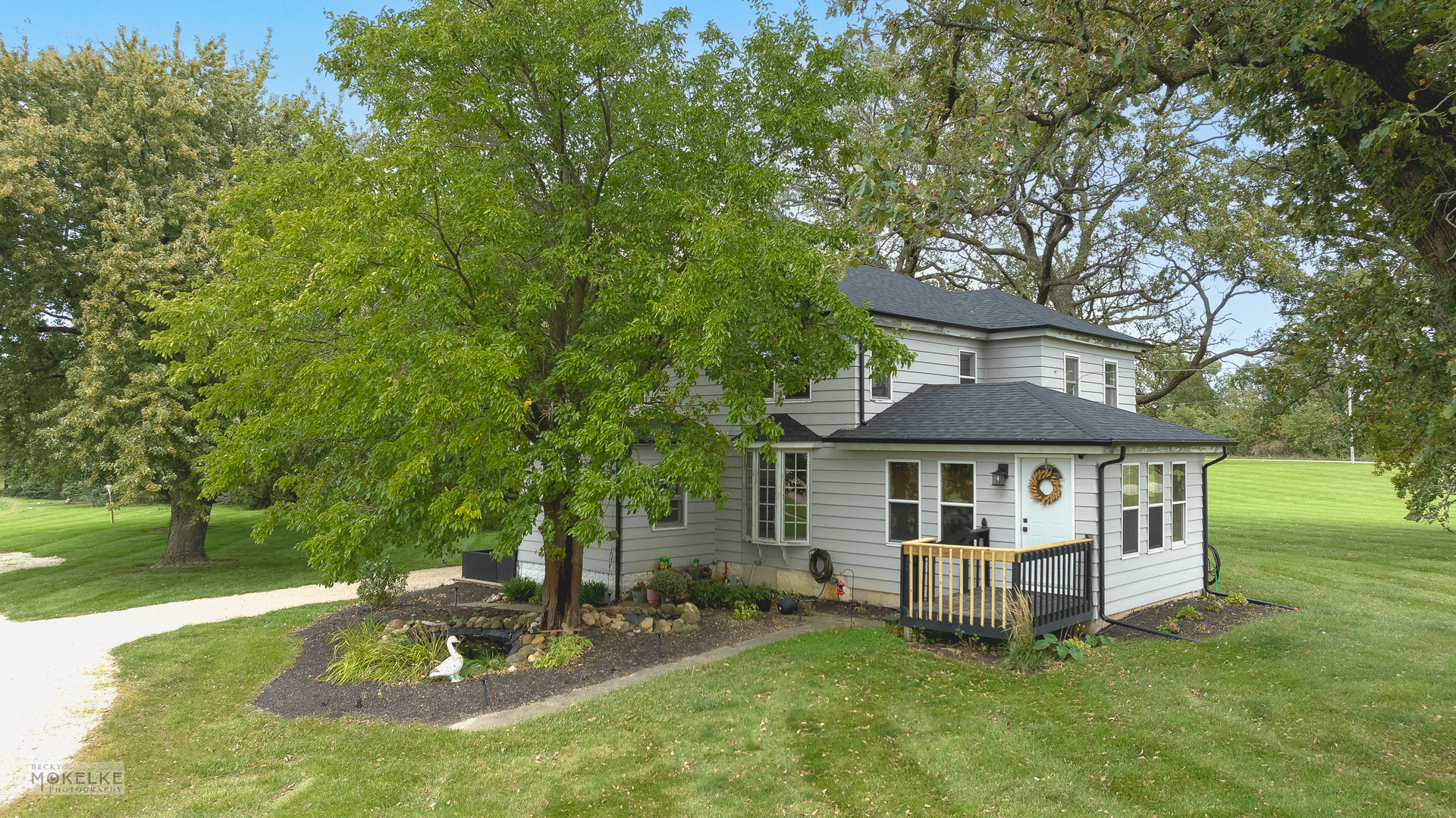 3494 Howlett Road Paw Paw, IL 61353 - Photo 29 of 47 a view of a house with a yard porch and sitting area