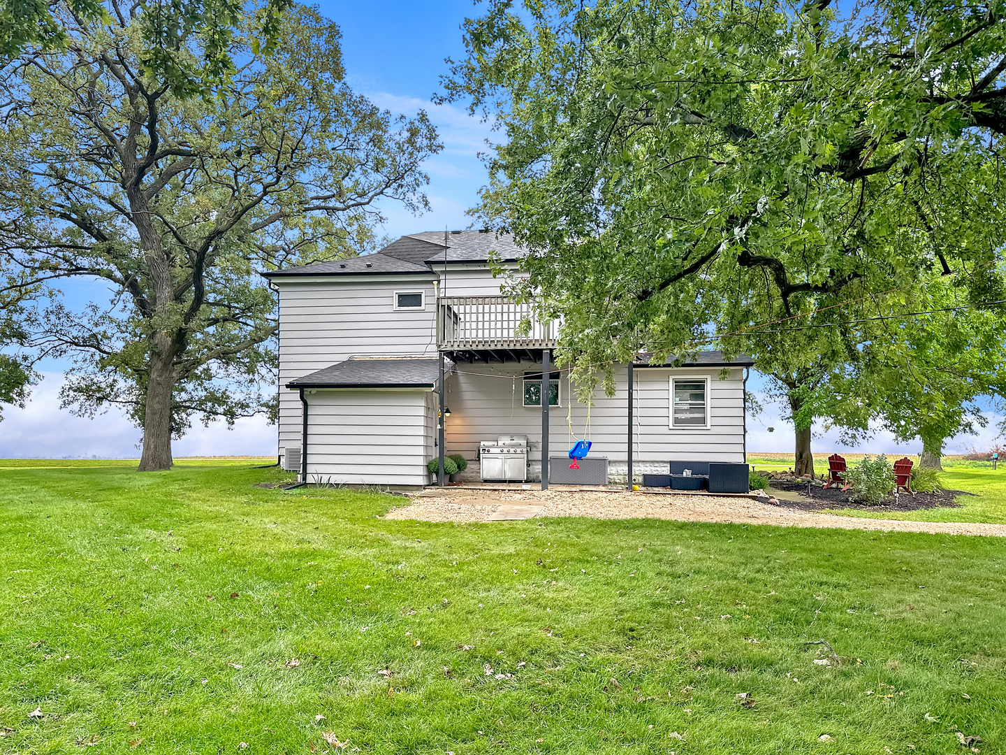 3494 Howlett Road Paw Paw, IL 61353 - Photo 3 of 47 a view of a house with a yard and sitting area