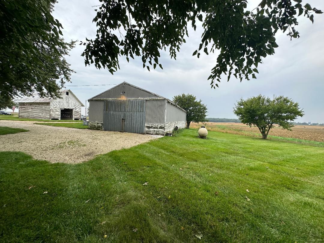 3494 Howlett Road Paw Paw, IL 61353 - Photo 37 of 47 a front view of a house with a yard