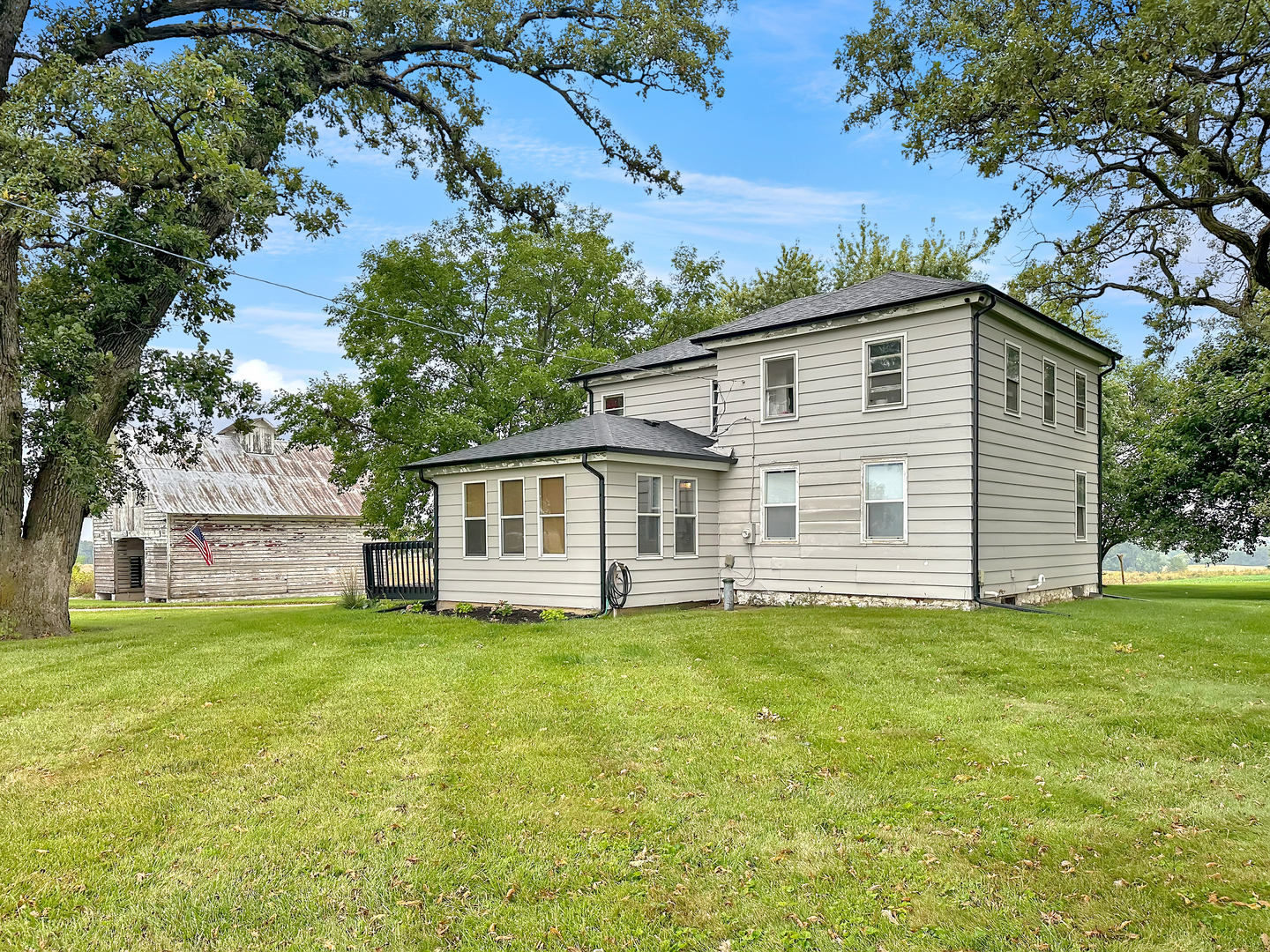 3494 Howlett Road Paw Paw, IL 61353 - Photo 4 of 47 a view of a house with a yard