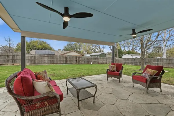 a view of yard with seating area and green space
