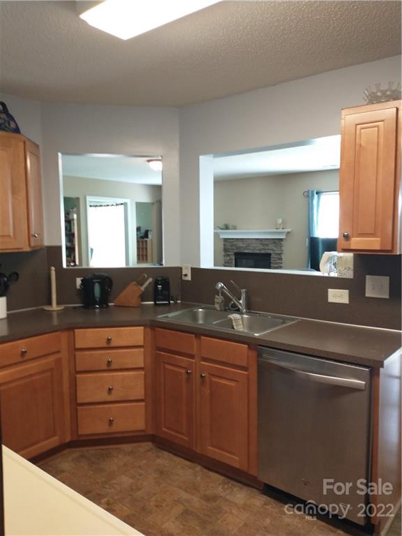 720 Raindrops Road Gastonia, NC 28054 - Photo 4 of 19 a spacious bathroom with a granite countertop sink and a mirror