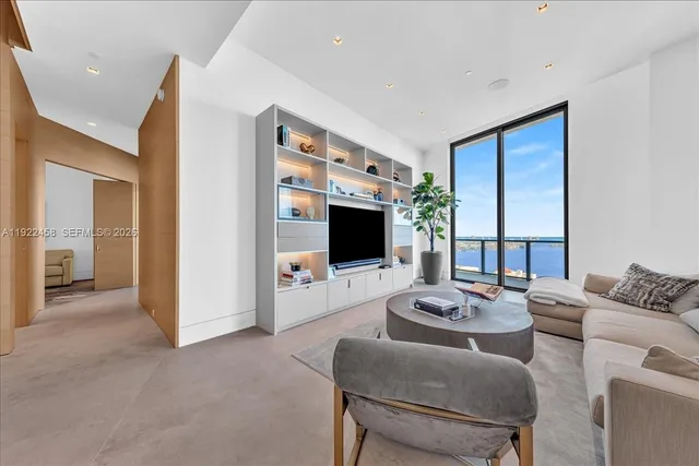 a view of a hallway with staircase