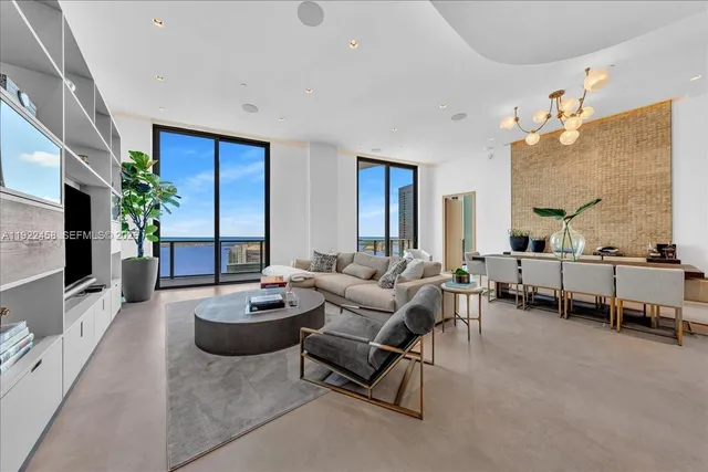 a view of a cafe with sitting area