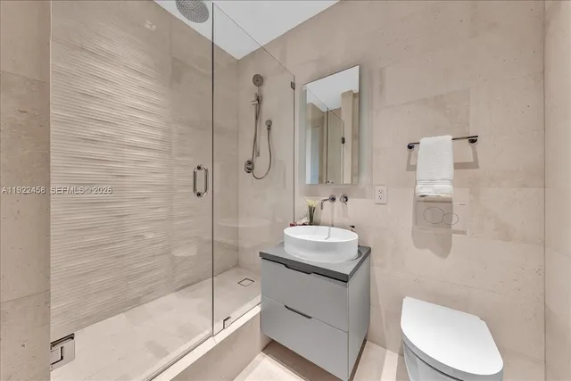 a view of a livingroom and a hallway