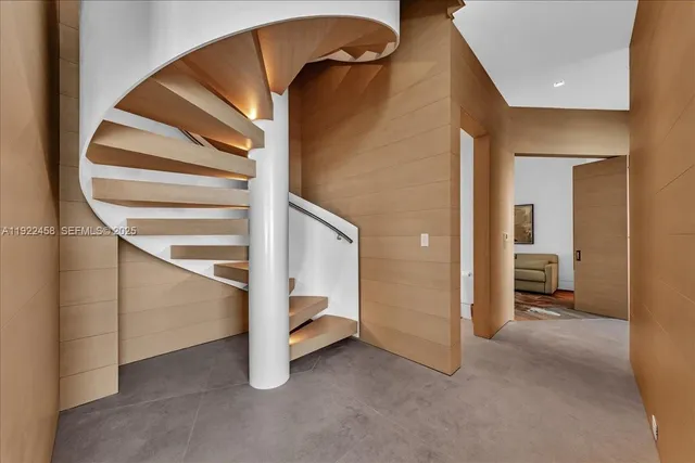 a view of a hallway with staircase