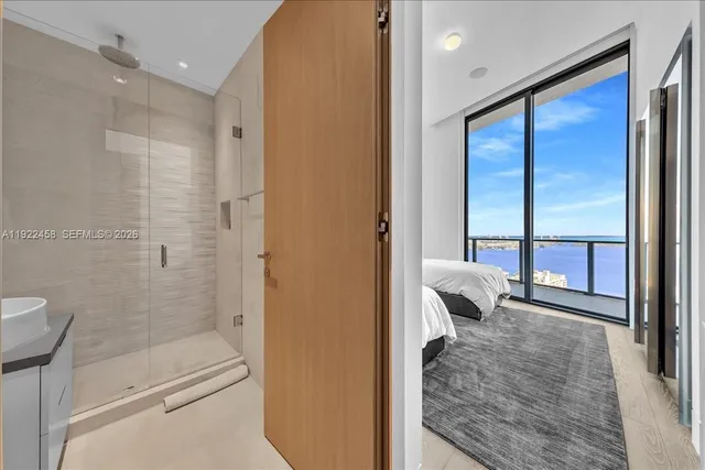 a view of a living room and a balcony