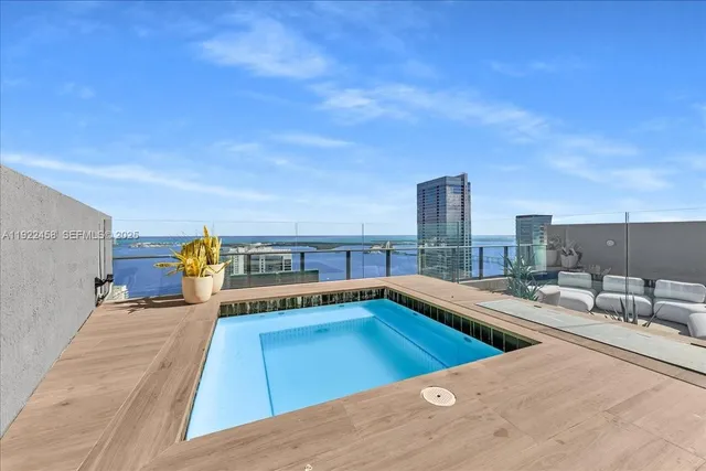 a view of a city with tall buildings