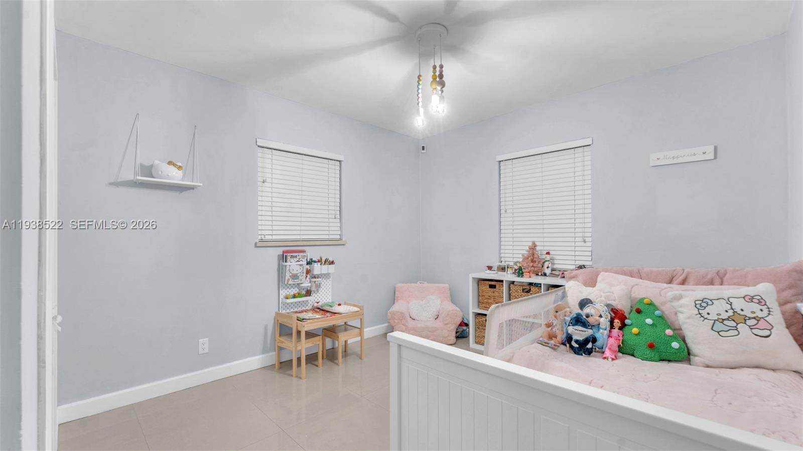 8261 Southwest 27th Street Miami, FL 33155 - Photo 6 of 27 a dining room with furniture and chandelier