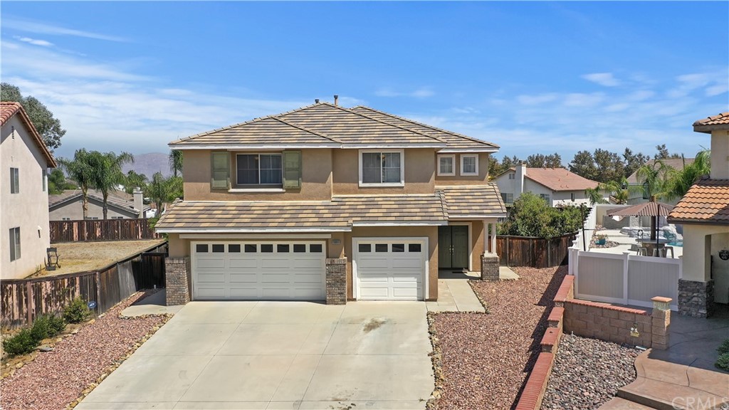 19890 Lenisha Lane Riverside, CA 92508 - Photo 1 of 1 a front view of a house with a garage