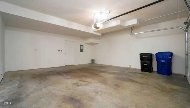 an empty room with chandelier